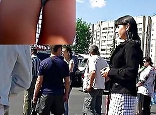 Voyeur video of a hot brunette walkin outside upskirt porno