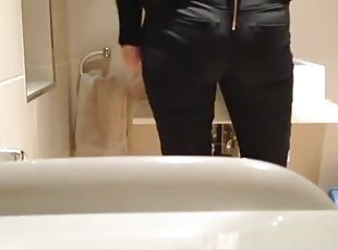 Hidden camera in bathroom spies woman