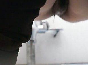 Spy toilet camera catches a sexy mature woman's pussy peeing