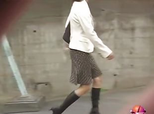 Cute Asian in boots got skirt sharked and undies seen