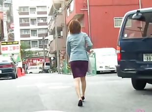 Skinny Asian girl strolling down the street got top sharked