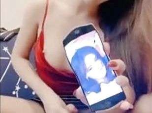 Asian Ladyboy masturbating and cumming on her cellphone
